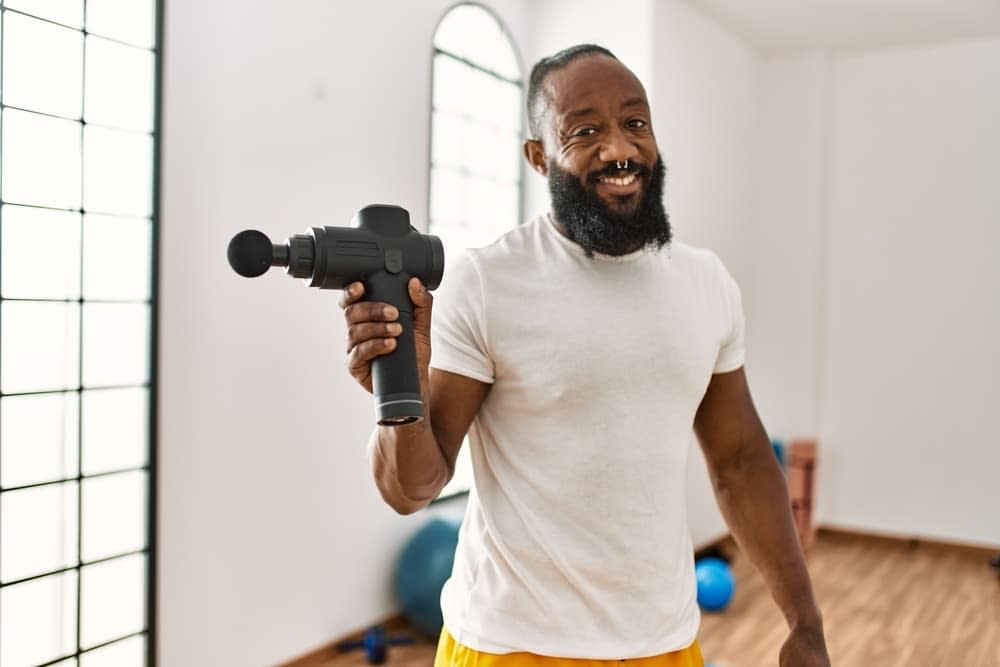 How to Use Massage Guns When Working Out