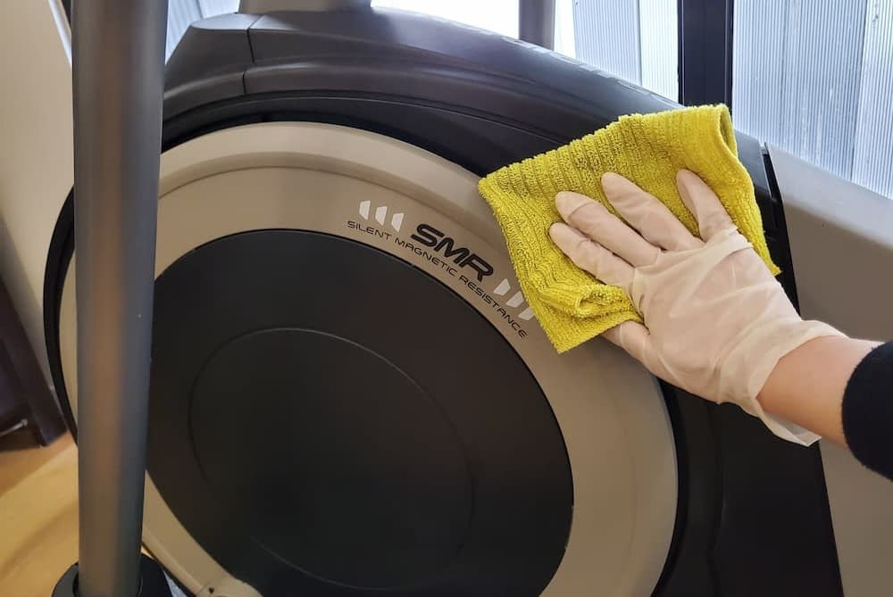 Wipe the surface of the elliptical machine with a microfibre cloth