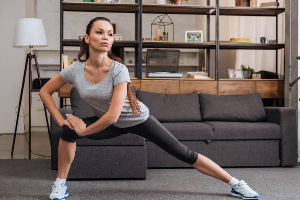 Woman Doing the Side Lunge at Home